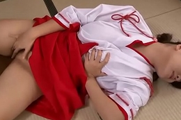 Abstruse Oriental in a red and white kimono rubs her cunt